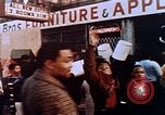 Image of looting of Wolfe Bros. furniture store during riots Washington DC USA, 1968, second 30 stock footage video 65675070916