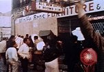 Image of looting of Wolfe Bros. furniture store during riots Washington DC USA, 1968, second 31 stock footage video 65675070916