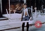 Image of looting of Wolfe Bros. furniture store during riots Washington DC USA, 1968, second 34 stock footage video 65675070916