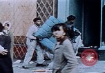 Image of looting of Wolfe Bros. furniture store during riots Washington DC USA, 1968, second 35 stock footage video 65675070916