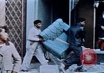 Image of looting of Wolfe Bros. furniture store during riots Washington DC USA, 1968, second 36 stock footage video 65675070916