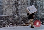 Image of looting of Wolfe Bros. furniture store during riots Washington DC USA, 1968, second 38 stock footage video 65675070916