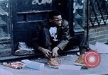 Image of looting of Wolfe Bros. furniture store during riots Washington DC USA, 1968, second 41 stock footage video 65675070916