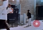 Image of looting of Wolfe Bros. furniture store during riots Washington DC USA, 1968, second 46 stock footage video 65675070916