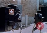 Image of looting of Wolfe Bros. furniture store during riots Washington DC USA, 1968, second 48 stock footage video 65675070916