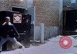 Image of looting of Wolfe Bros. furniture store during riots Washington DC USA, 1968, second 51 stock footage video 65675070916
