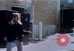 Image of looting of Wolfe Bros. furniture store during riots Washington DC USA, 1968, second 52 stock footage video 65675070916