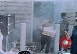 Image of looting of Wolfe Bros. furniture store during riots Washington DC USA, 1968, second 53 stock footage video 65675070916