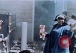 Image of looting of Wolfe Bros. furniture store during riots Washington DC USA, 1968, second 54 stock footage video 65675070916
