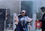 Image of looting of Wolfe Bros. furniture store during riots Washington DC USA, 1968, second 56 stock footage video 65675070916