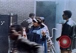 Image of looting of Wolfe Bros. furniture store during riots Washington DC USA, 1968, second 57 stock footage video 65675070916