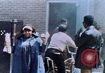 Image of looting of Wolfe Bros. furniture store during riots Washington DC USA, 1968, second 58 stock footage video 65675070916