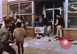Image of looters at pawn shop Washington DC USA, 1968, second 16 stock footage video 65675070917