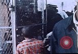Image of looters robbing Tabbs shoe store Washington DC USA, 1968, second 7 stock footage video 65675070918