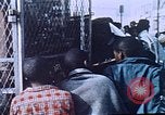Image of looters robbing Tabbs shoe store Washington DC USA, 1968, second 8 stock footage video 65675070918