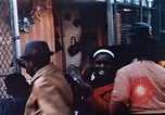 Image of looters robbing Tabbs shoe store Washington DC USA, 1968, second 25 stock footage video 65675070918