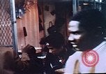 Image of looters robbing Tabbs shoe store Washington DC USA, 1968, second 26 stock footage video 65675070918