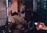 Image of looters robbing Tabbs shoe store Washington DC USA, 1968, second 29 stock footage video 65675070918