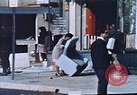 Image of looters robbing Tabbs shoe store Washington DC USA, 1968, second 34 stock footage video 65675070918