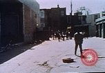 Image of looters robbing Tabbs shoe store Washington DC USA, 1968, second 36 stock footage video 65675070918