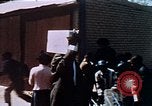 Image of looters robbing Tabbs shoe store Washington DC USA, 1968, second 49 stock footage video 65675070918