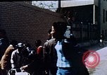 Image of looters robbing Tabbs shoe store Washington DC USA, 1968, second 51 stock footage video 65675070918
