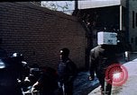 Image of looters robbing Tabbs shoe store Washington DC USA, 1968, second 52 stock footage video 65675070918