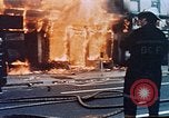 Image of burning building in riot after death of Martin Luther King Jr Washington DC USA, 1968, second 10 stock footage video 65675070919