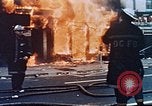 Image of burning building in riot after death of Martin Luther King Jr Washington DC USA, 1968, second 11 stock footage video 65675070919
