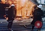 Image of burning building in riot after death of Martin Luther King Jr Washington DC USA, 1968, second 12 stock footage video 65675070919