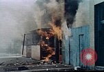 Image of burning building in riot after death of Martin Luther King Jr Washington DC USA, 1968, second 17 stock footage video 65675070919