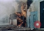 Image of burning building in riot after death of Martin Luther King Jr Washington DC USA, 1968, second 18 stock footage video 65675070919