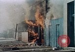 Image of burning building in riot after death of Martin Luther King Jr Washington DC USA, 1968, second 19 stock footage video 65675070919