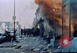 Image of burning building in riot after death of Martin Luther King Jr Washington DC USA, 1968, second 20 stock footage video 65675070919