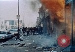 Image of burning building in riot after death of Martin Luther King Jr Washington DC USA, 1968, second 23 stock footage video 65675070919