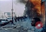 Image of burning building in riot after death of Martin Luther King Jr Washington DC USA, 1968, second 24 stock footage video 65675070919