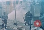 Image of burning building in riot after death of Martin Luther King Jr Washington DC USA, 1968, second 30 stock footage video 65675070919