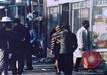 Image of burning building in riot after death of Martin Luther King Jr Washington DC USA, 1968, second 40 stock footage video 65675070919