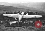 Image of Sightseers  surround downed German Heinkel He-111bomber Scotland United Kingdom, 1939, second 10 stock footage video 65675070948