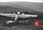 Image of Sightseers  surround downed German Heinkel He-111bomber Scotland United Kingdom, 1939, second 11 stock footage video 65675070948
