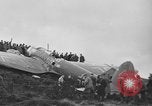 Image of Sightseers  surround downed German Heinkel He-111bomber Scotland United Kingdom, 1939, second 13 stock footage video 65675070948