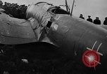 Image of Sightseers  surround downed German Heinkel He-111bomber Scotland United Kingdom, 1939, second 19 stock footage video 65675070948