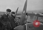Image of Sightseers  surround downed German Heinkel He-111bomber Scotland United Kingdom, 1939, second 23 stock footage video 65675070948