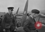 Image of Sightseers  surround downed German Heinkel He-111bomber Scotland United Kingdom, 1939, second 25 stock footage video 65675070948
