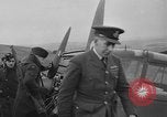 Image of Sightseers  surround downed German Heinkel He-111bomber Scotland United Kingdom, 1939, second 26 stock footage video 65675070948