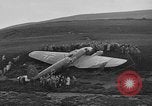 Image of Sightseers  surround downed German Heinkel He-111bomber Scotland United Kingdom, 1939, second 33 stock footage video 65675070948