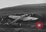 Image of Sightseers  surround downed German Heinkel He-111bomber Scotland United Kingdom, 1939, second 34 stock footage video 65675070948