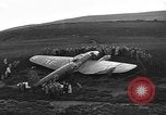 Image of Sightseers  surround downed German Heinkel He-111bomber Scotland United Kingdom, 1939, second 35 stock footage video 65675070948