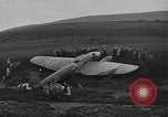 Image of Sightseers  surround downed German Heinkel He-111bomber Scotland United Kingdom, 1939, second 36 stock footage video 65675070948