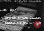 Image of spider in clock Akron Ohio USA, 1932, second 1 stock footage video 65675070961